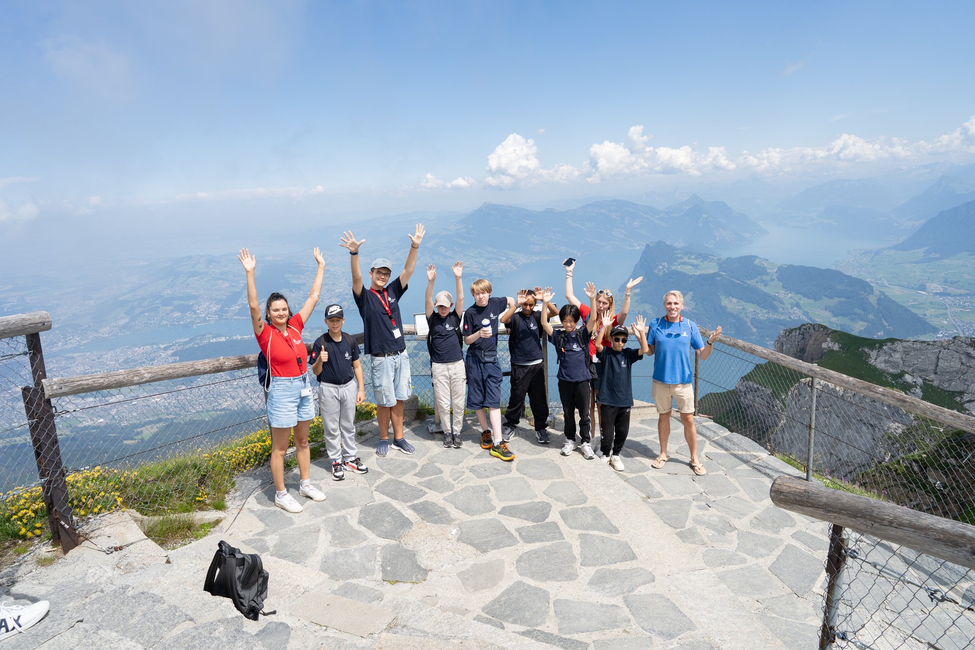 A group photo on a mountain.