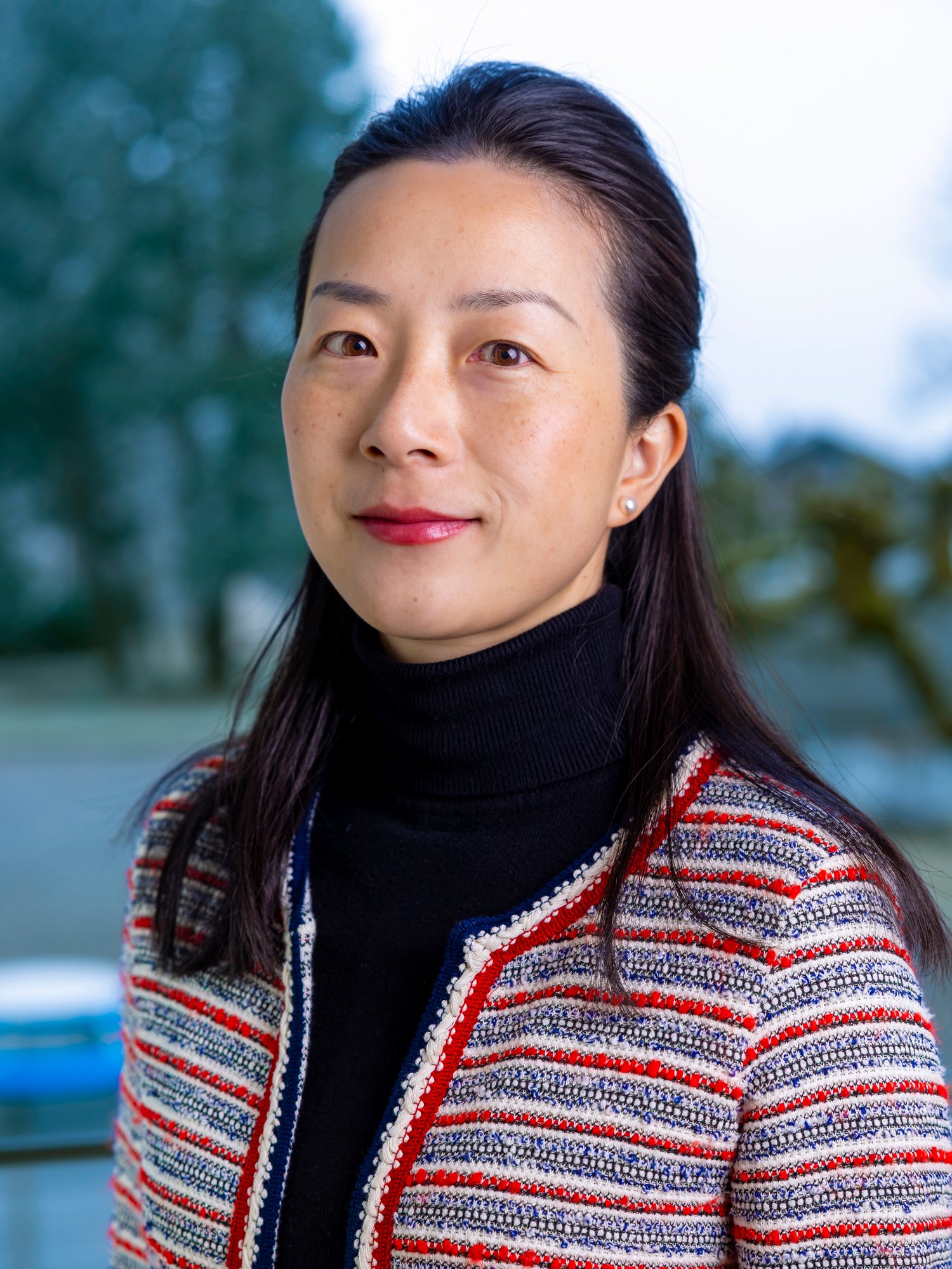 An asian woman with black hair. An asian woman with black hair.